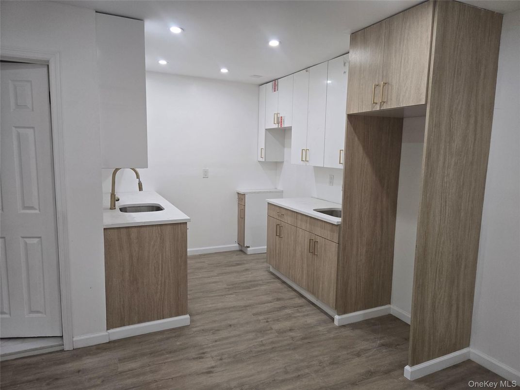 Interior, Kitchen, Recessed Lighting, Washer, Wood Texture Flooring