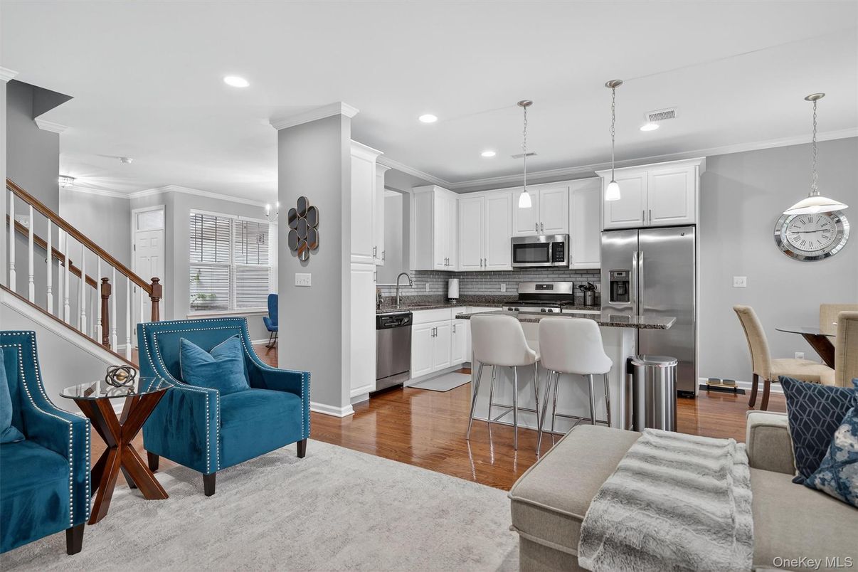Dining room, Interior, Kitchen, Pendant Lights, Recessed Lighting, Stainless Steel Appliances, Wood Texture Flooring