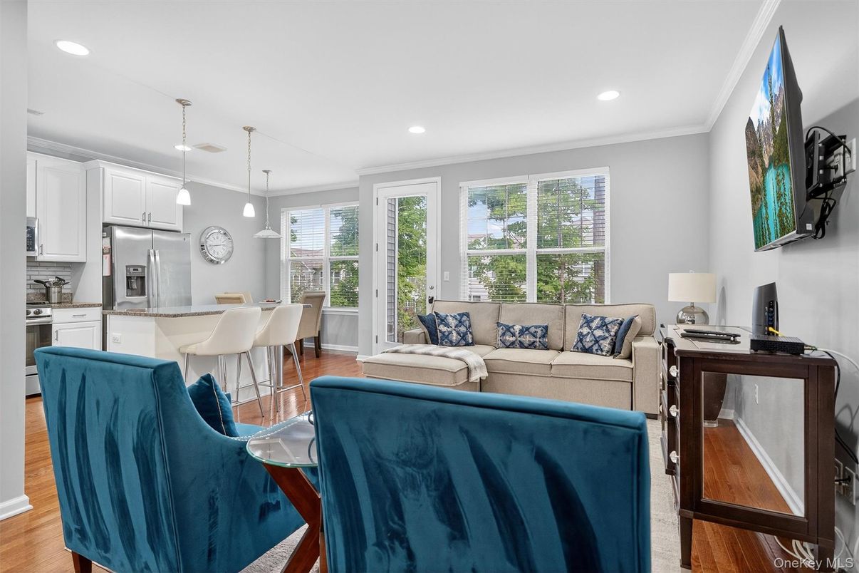 Dining room, Interior, Kitchen, Living room, Pendant Lights, Recessed Lighting, Stainless Steel Appliances, Wood Texture Flooring