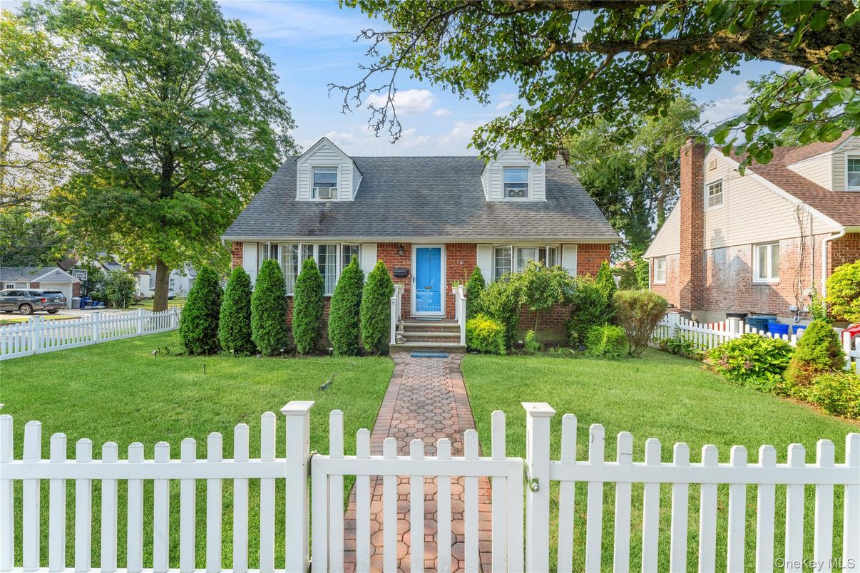 Exterior, Facade, Brick Facade, Cape Cod