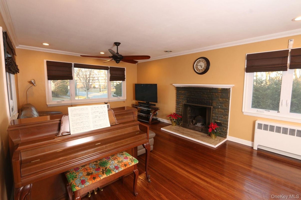 Fireplace, Interior, Piano, Recessed Lighting, Wood Texture Flooring