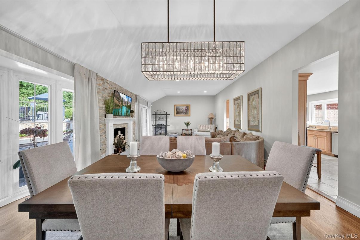 Chandelier, Dining room, Fireplace, Interior, Living room, Recessed Lighting, Wood Texture Flooring