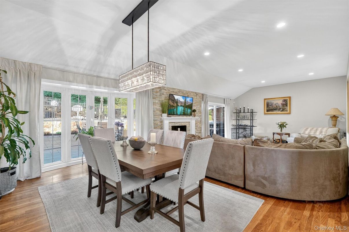 Chandelier, Dining room, Fireplace, Interior, Living room, Recessed Lighting, Wood Texture Flooring