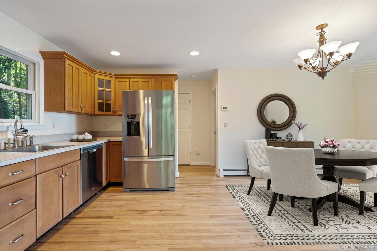 Chandelier, Dining room, Interior, Kitchen, Recessed Lighting, Stainless Steel Appliances, Wood Texture Flooring