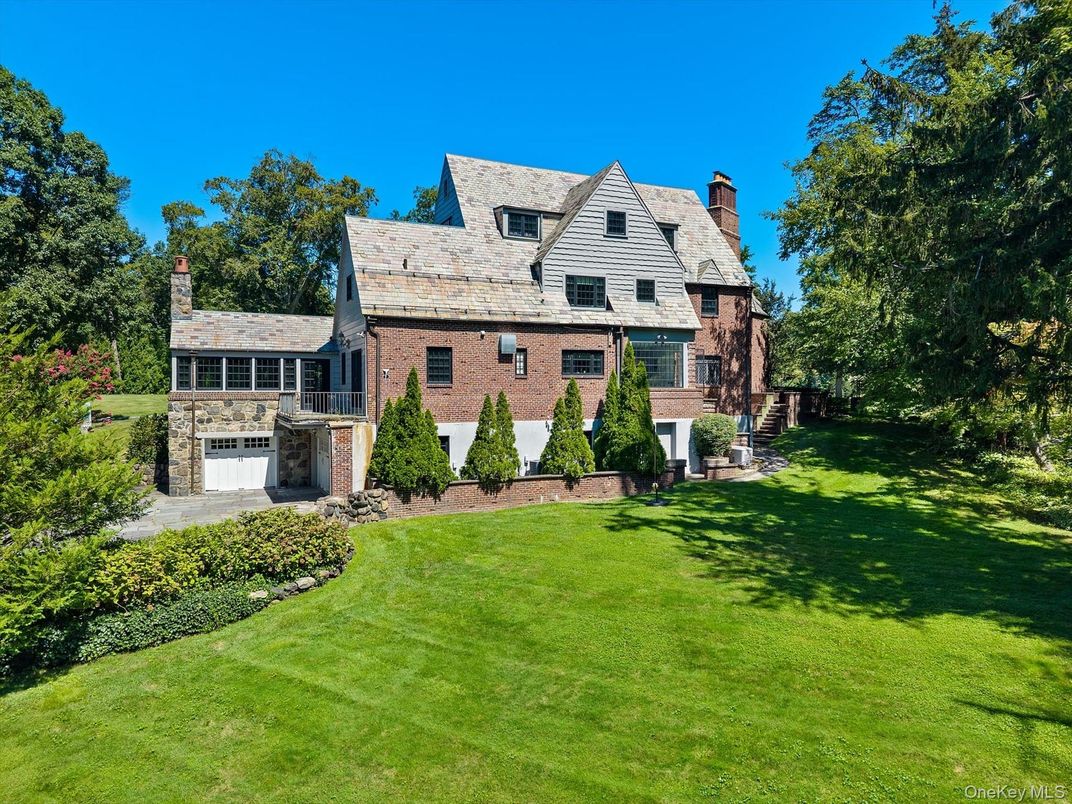 Attached, Backyard, Exterior, Facade, Brick Facade, Cape Cod