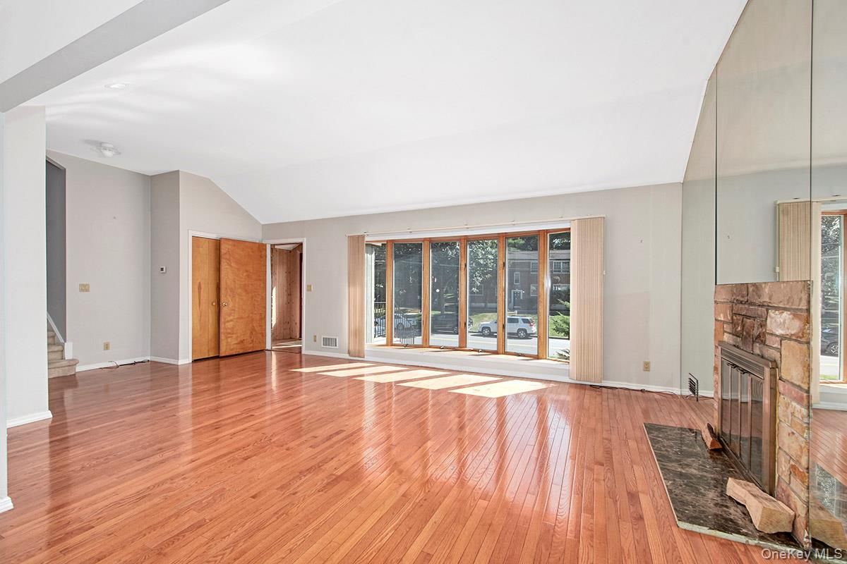 Empty room, Fireplace, Interior, Recessed Lighting, Wood Texture Flooring