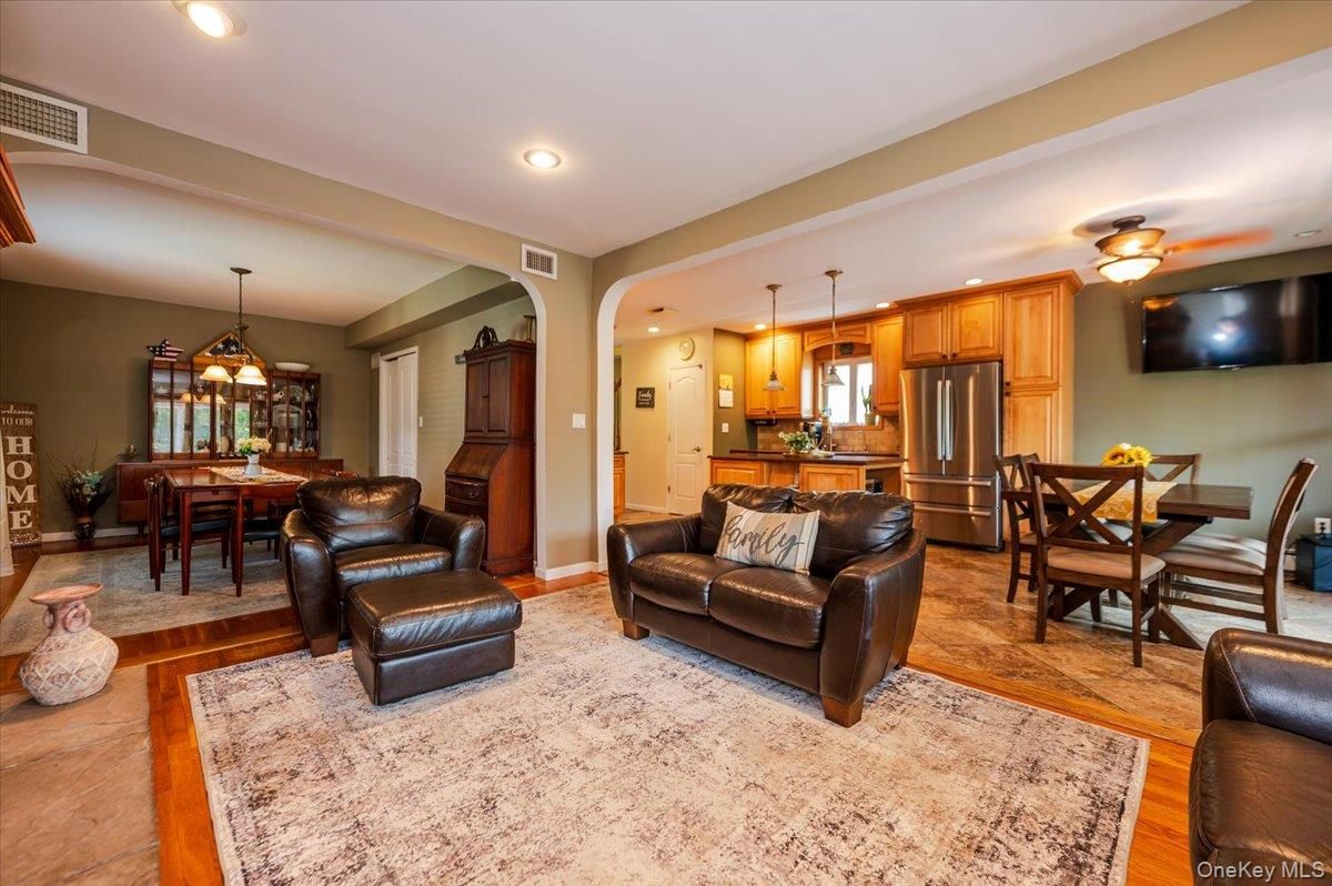 Dining room, Interior, Kitchen, Living room, Pendant Lights, Recessed Lighting, Stainless Steel Appliances, Wood Texture Flooring