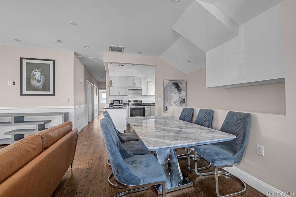 Dining room, Interior, Kitchen, Living room, Recessed Lighting, Stainless Steel Appliances, Wood Texture Flooring