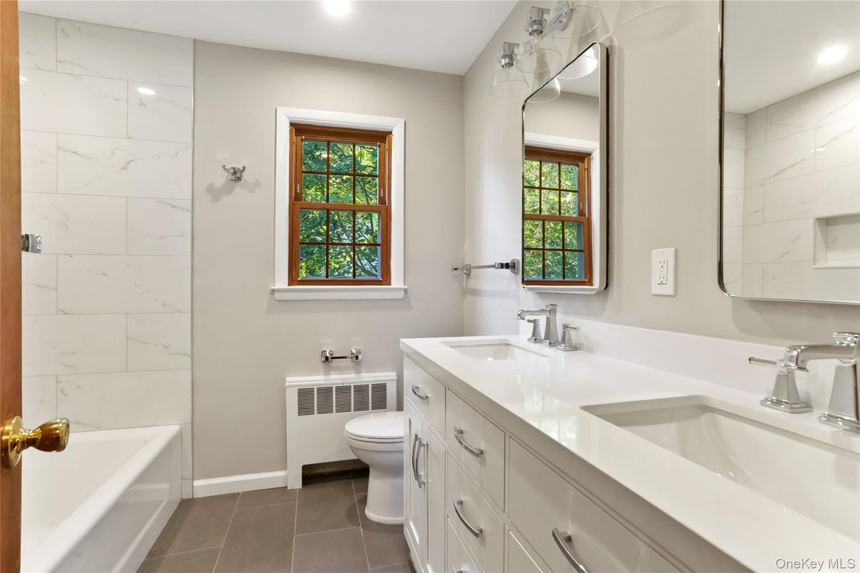 Bathroom, Dual Sink Vanities, Interior, Marble Walls, Recessed Lighting