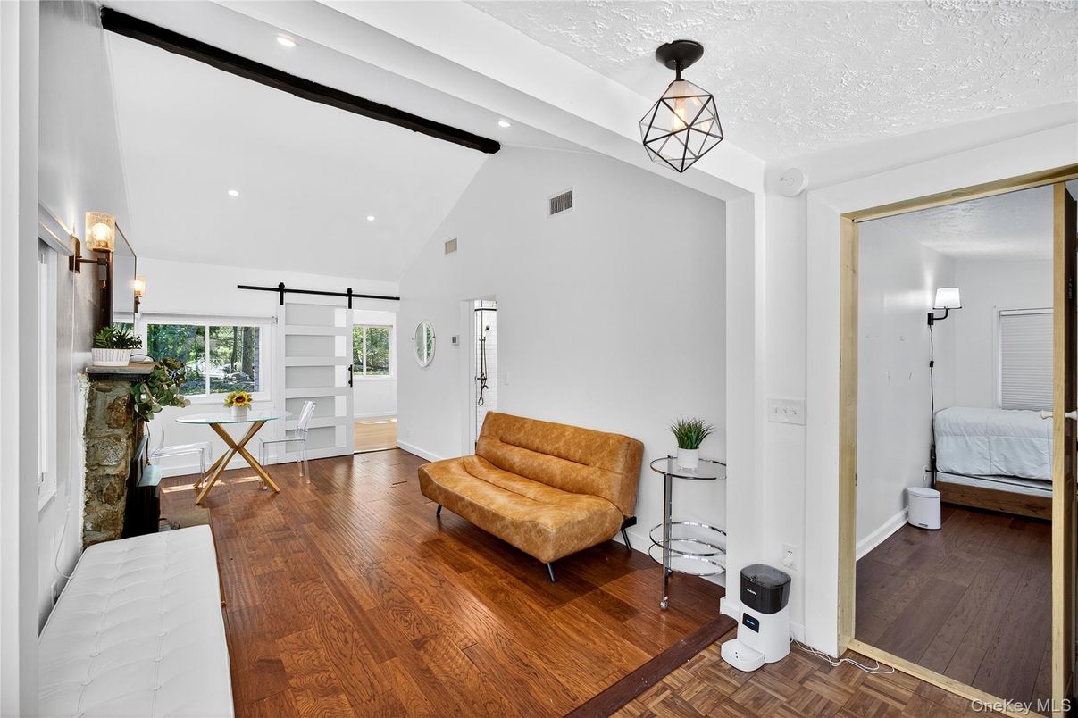 Bedroom, Fireplace, Interior, Recessed Lighting, Wood Texture Flooring