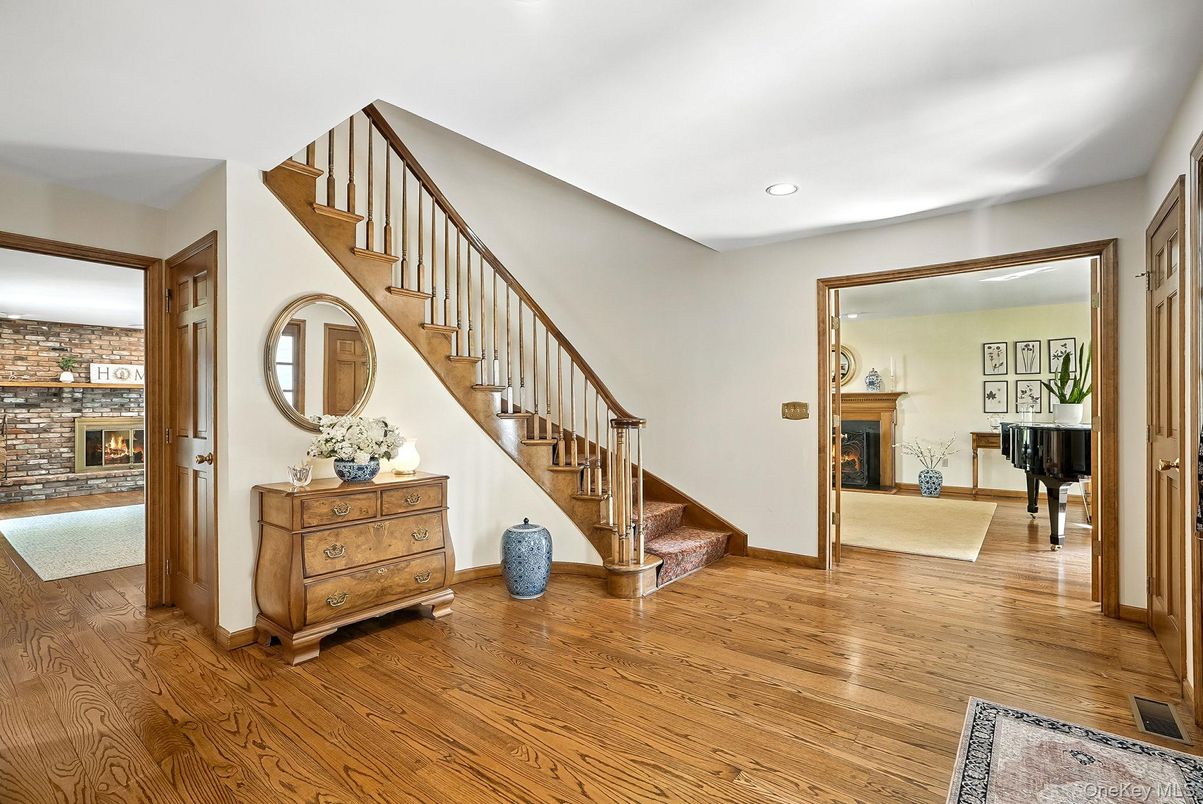 Fireplace, Interior, Piano, Recessed Lighting, Stone Walls, Wood Texture Flooring