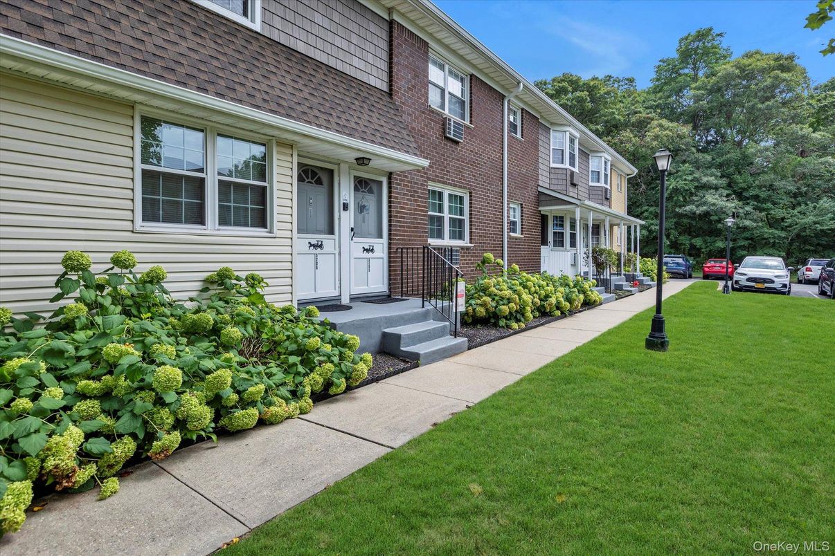 Exterior, Facade, Brick Facade, Cape Cod