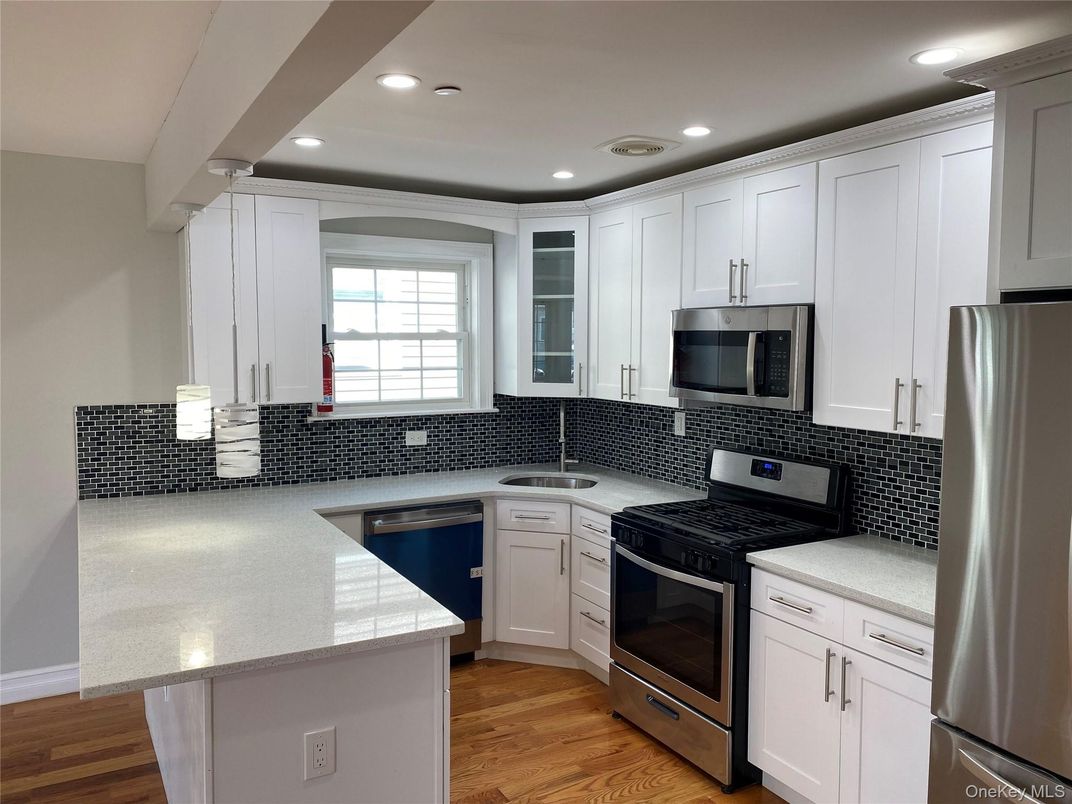 Interior, Kitchen, Recessed Lighting, Stainless Steel Appliances, Wood Texture Flooring