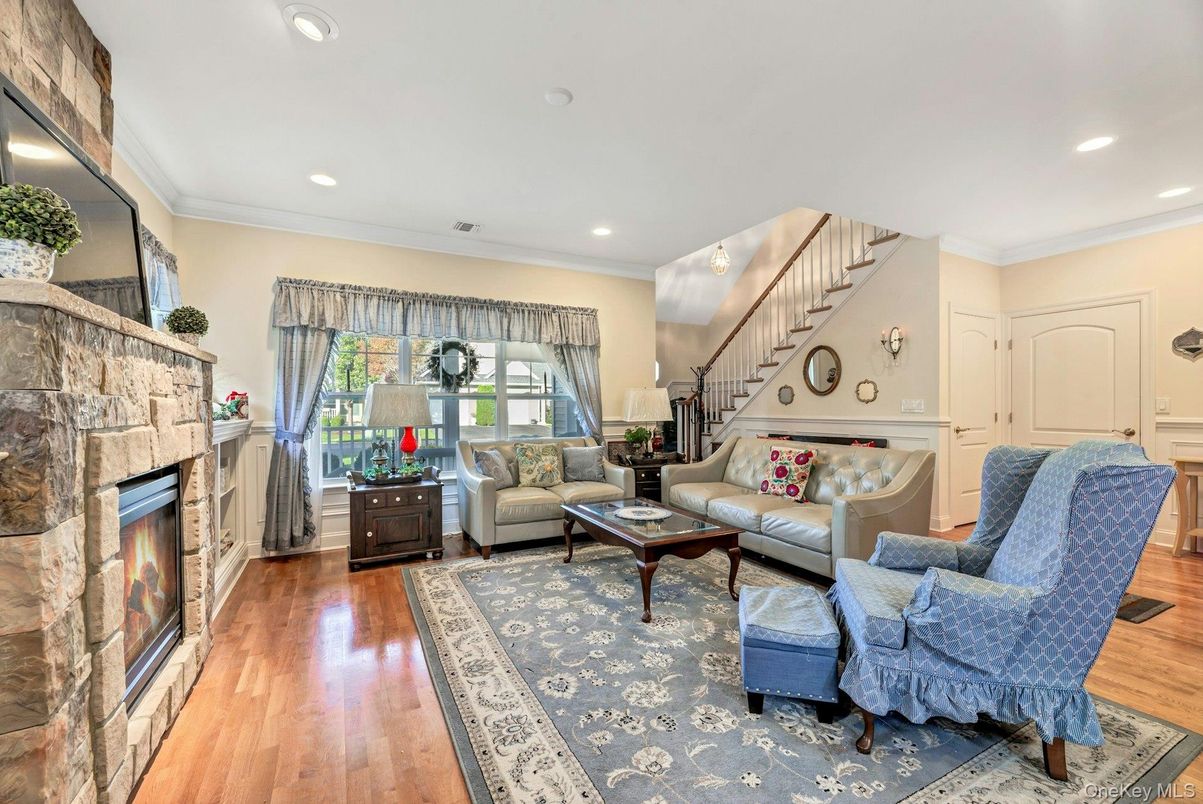 Fireplace, Interior, Living room, Recessed Lighting, Wood Texture Flooring