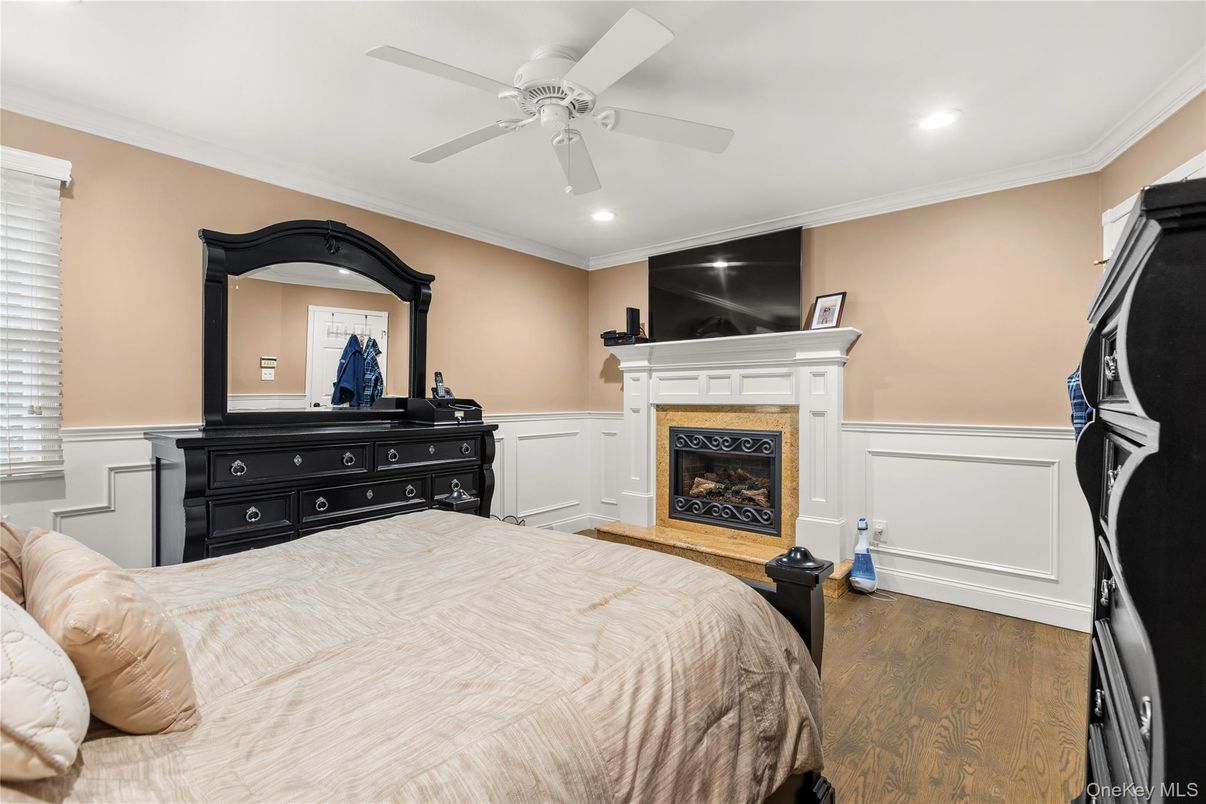 Bedroom, Fireplace, Interior, Recessed Lighting, Wood Texture Flooring