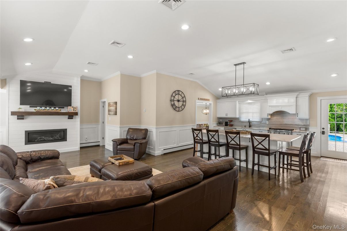 Dining room, Fireplace, Interior, Kitchen, Living room, Pendant Lights, Recessed Lighting, Wood Texture Flooring