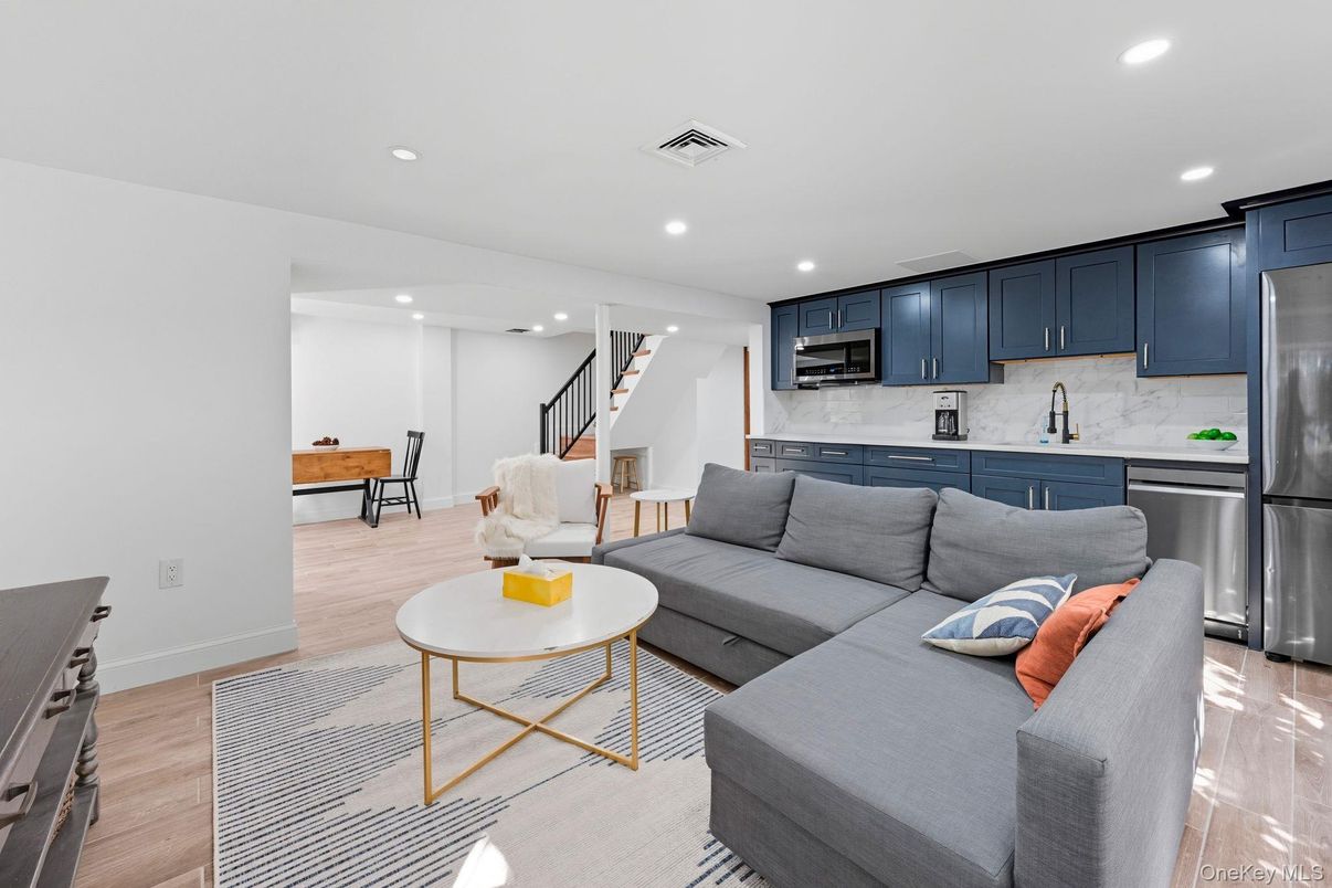 Interior, Kitchen, Living room, Marble Walls, Recessed Lighting, Stainless Steel Appliances, Wood Texture Flooring