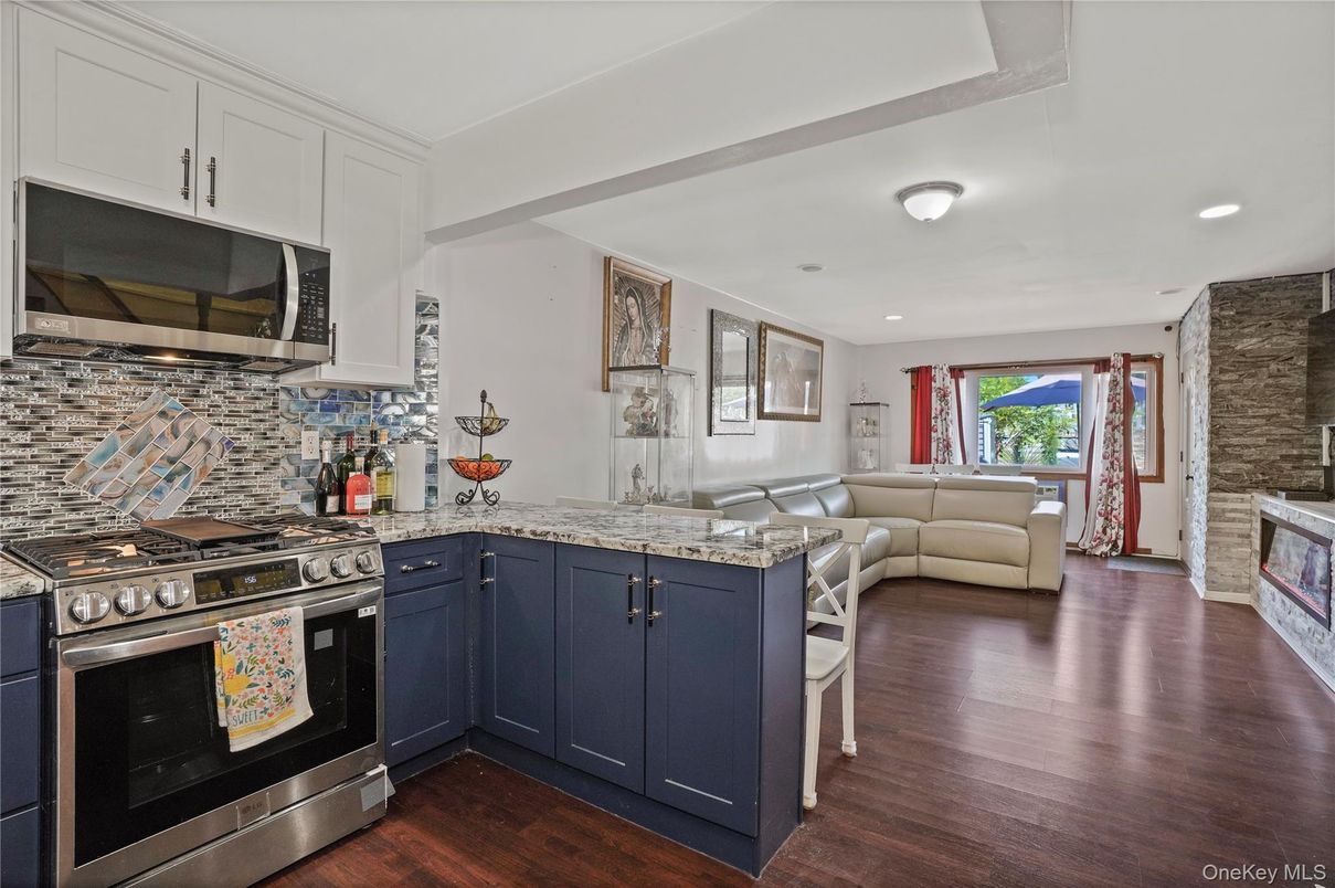 Interior, Kitchen, Living room, Recessed Lighting, Stainless Steel Appliances, Stone Walls, Wood Texture Flooring