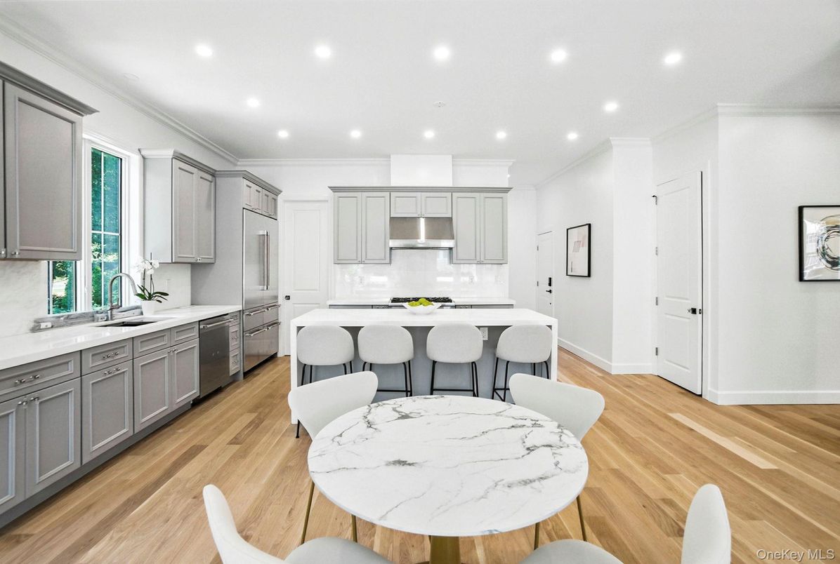 Dining room, Interior, Kitchen, Recessed Lighting, Stainless Steel Appliances, Wood Texture Flooring