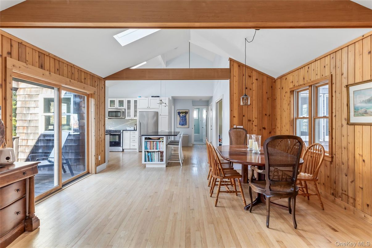Dining room, Interior, Kitchen, Pendant Lights, Stainless Steel Appliances, Wood Texture Flooring, Wooden Walls