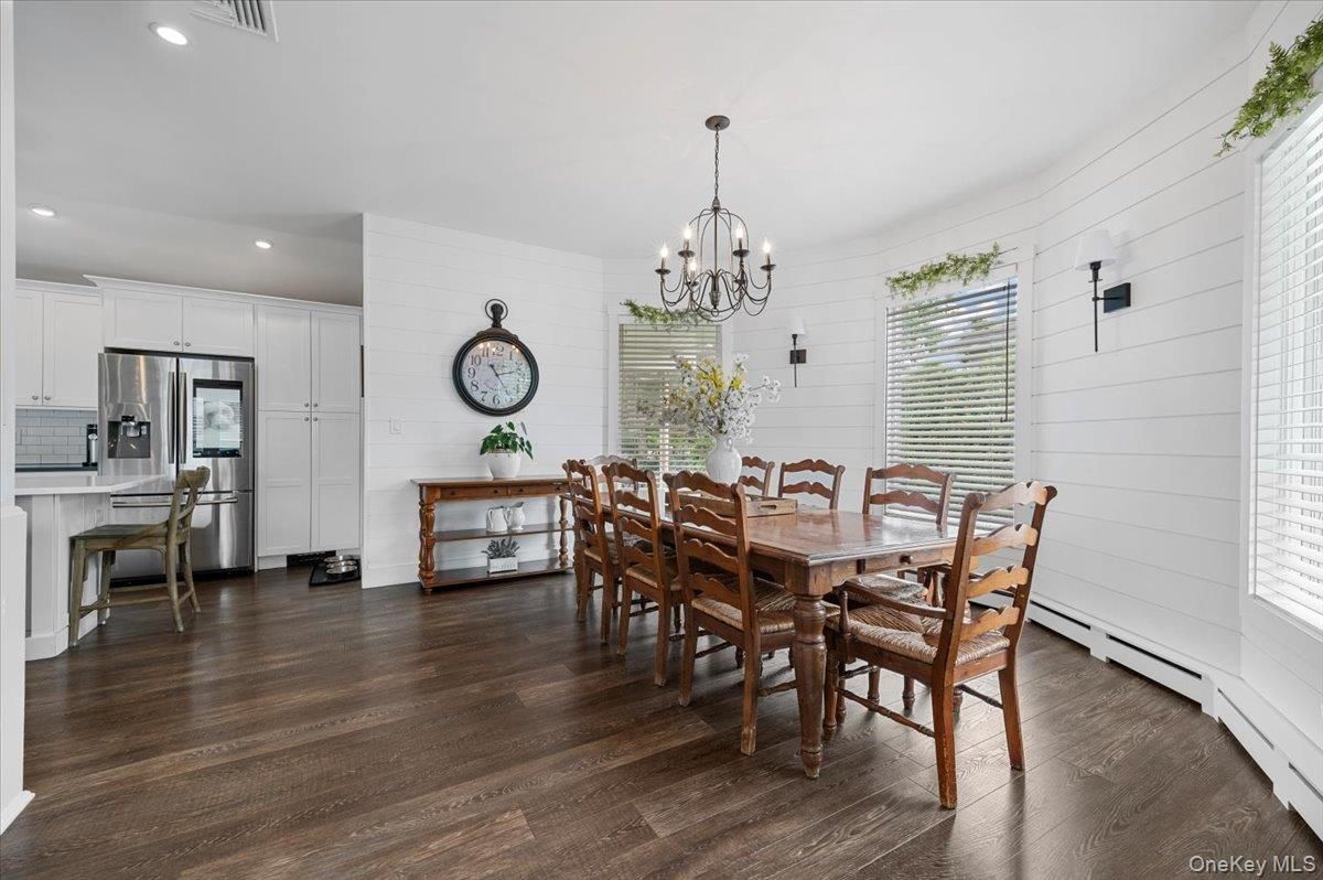Chandelier, Dining room, Interior, Kitchen, Recessed Lighting, Stainless Steel Appliances, Wood Texture Flooring