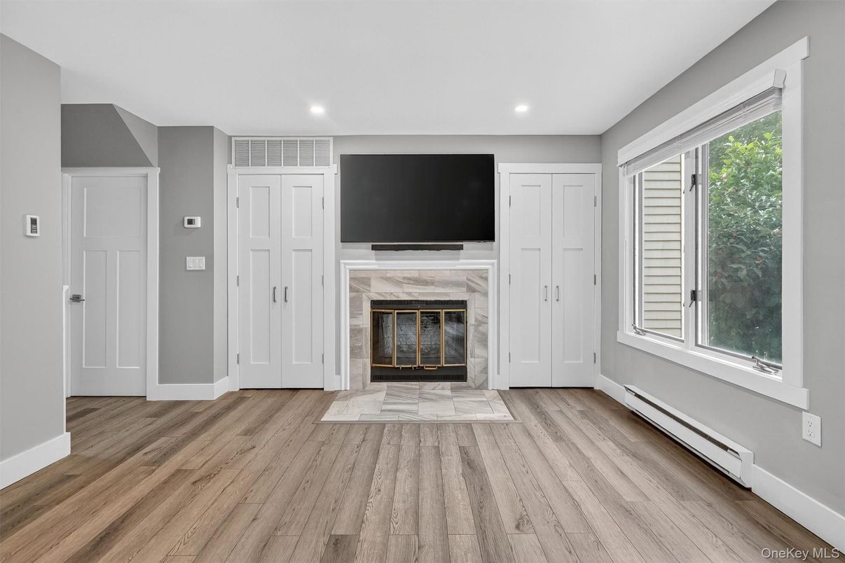 Empty room, Fireplace, Interior, Recessed Lighting, Wood Texture Flooring