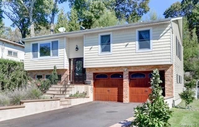 Attached, Exterior, Facade, Raised Ranch