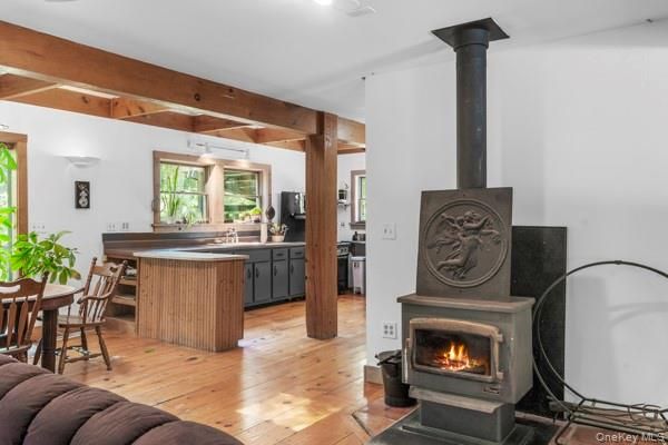 Dining room, Fireplace, Interior, Kitchen, Pendant Lights, Wooden Beams, Wood Texture Flooring