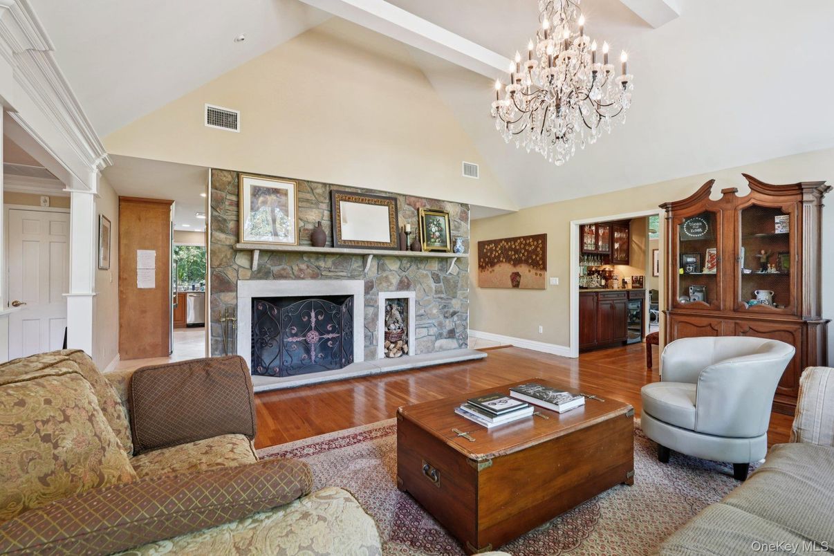 Chandelier, Fireplace, Interior, Living room, Recessed Lighting, Wood Texture Flooring