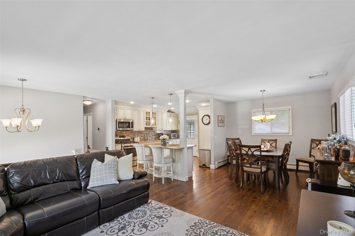 Chandelier, Dining room, Interior, Kitchen, Living room, Pendant Lights, Recessed Lighting, Wood Texture Flooring