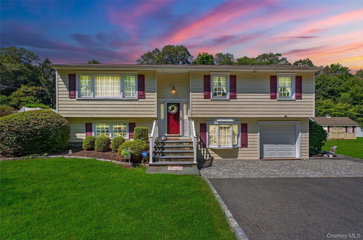 Attached, Exterior, Facade, Raised Ranch