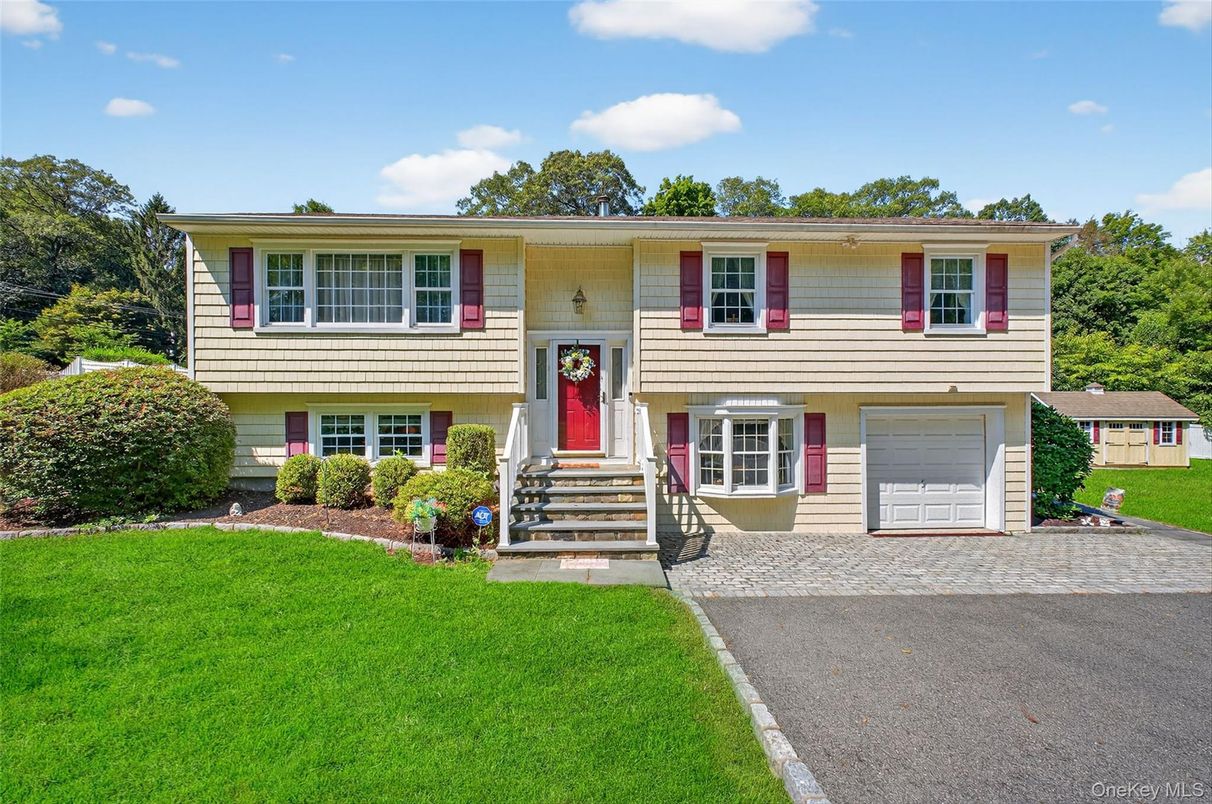 Attached, Exterior, Facade, Raised Ranch