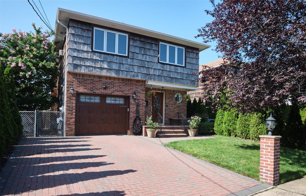 Attached, Exterior, Facade, Brick Facade, Raised Ranch