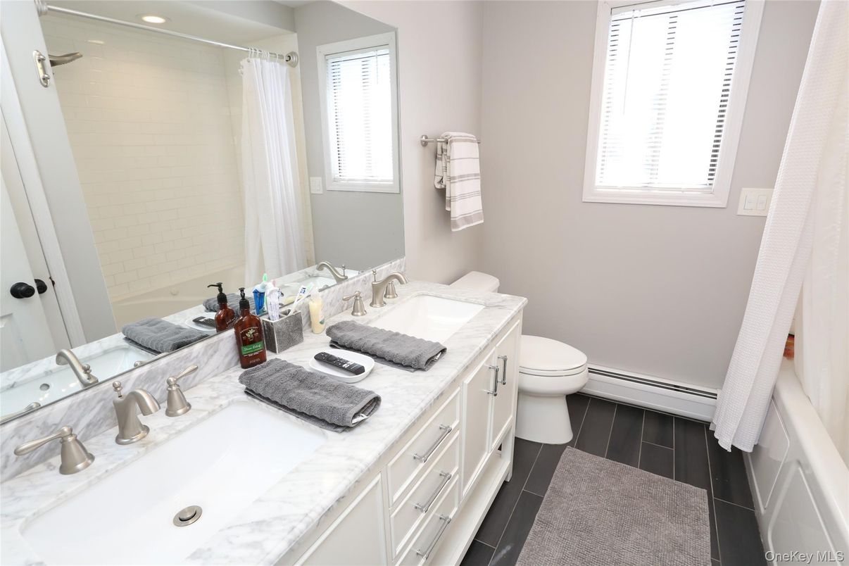 Bathroom, Dual Sink Vanities, Interior, Recessed Lighting, Wood Texture Flooring