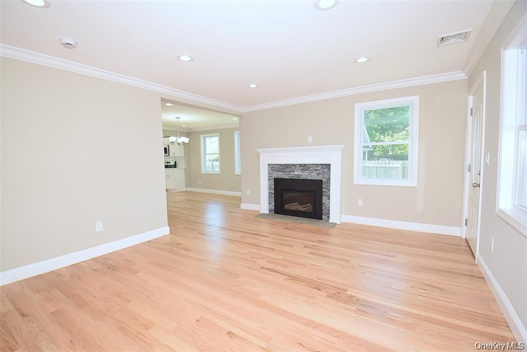 Empty room, Fireplace, Interior, Pendant Lights, Recessed Lighting, Wood Texture Flooring