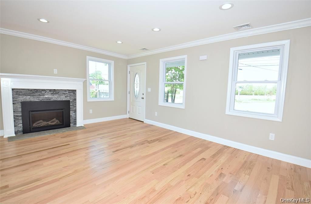 Empty room, Fireplace, Interior, Recessed Lighting, Wood Texture Flooring