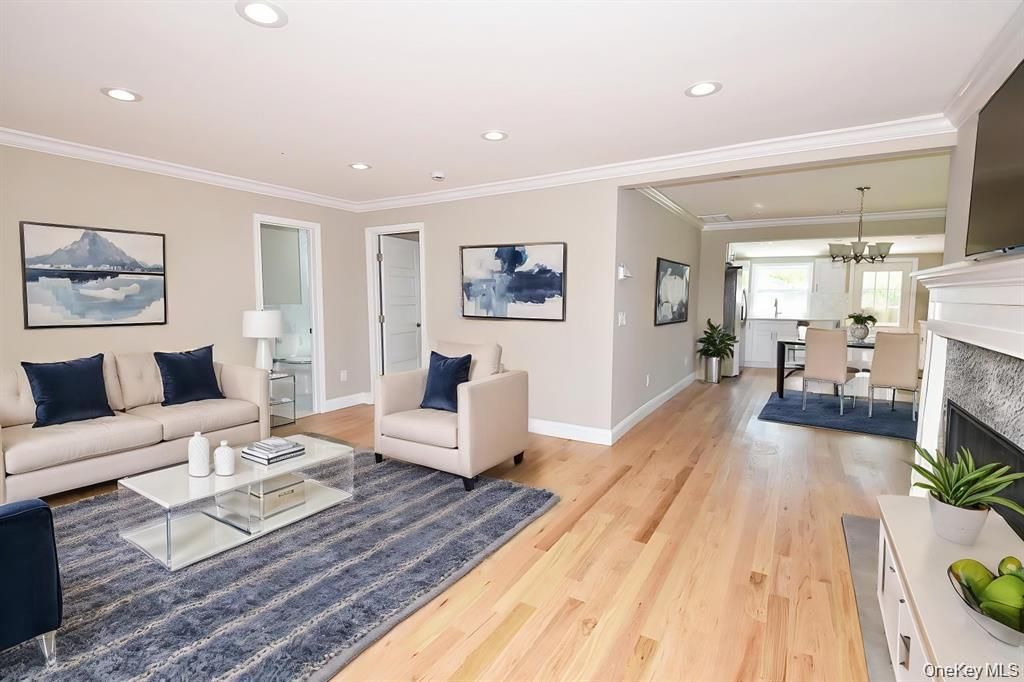 Dining room, Fireplace, Interior, Living room, Pendant Lights, Recessed Lighting, Wood Texture Flooring