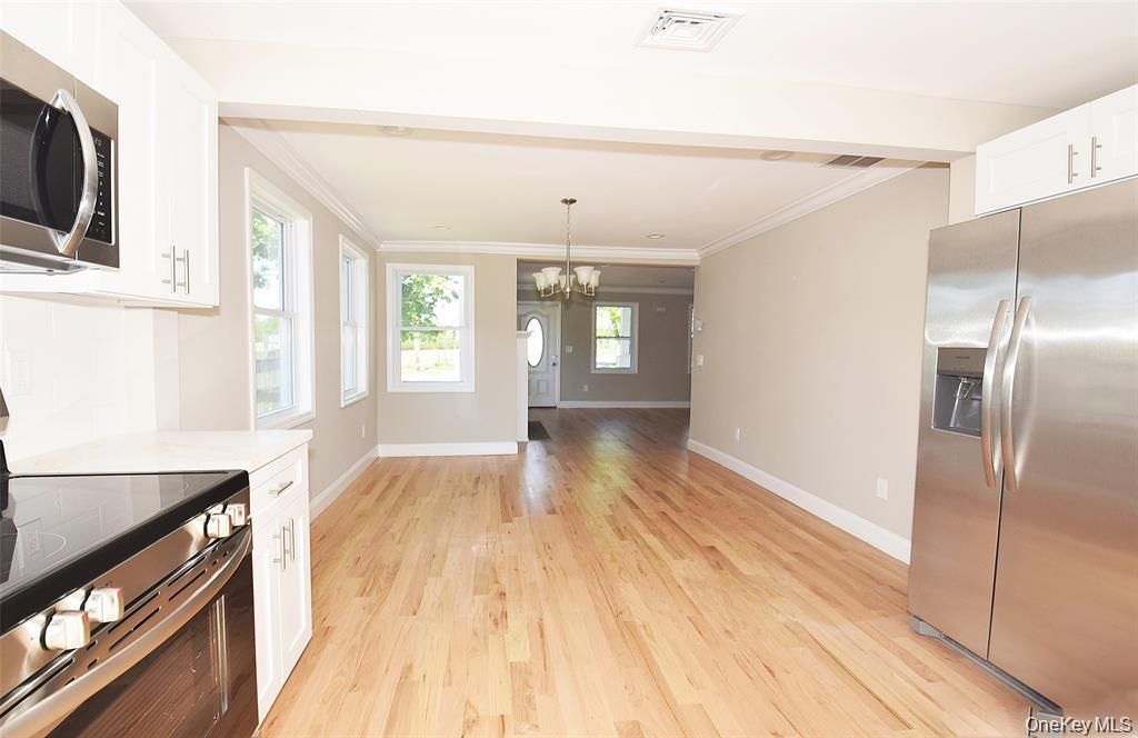 Chandelier, Empty room, Interior, Kitchen, Stainless Steel Appliances, Wood Texture Flooring