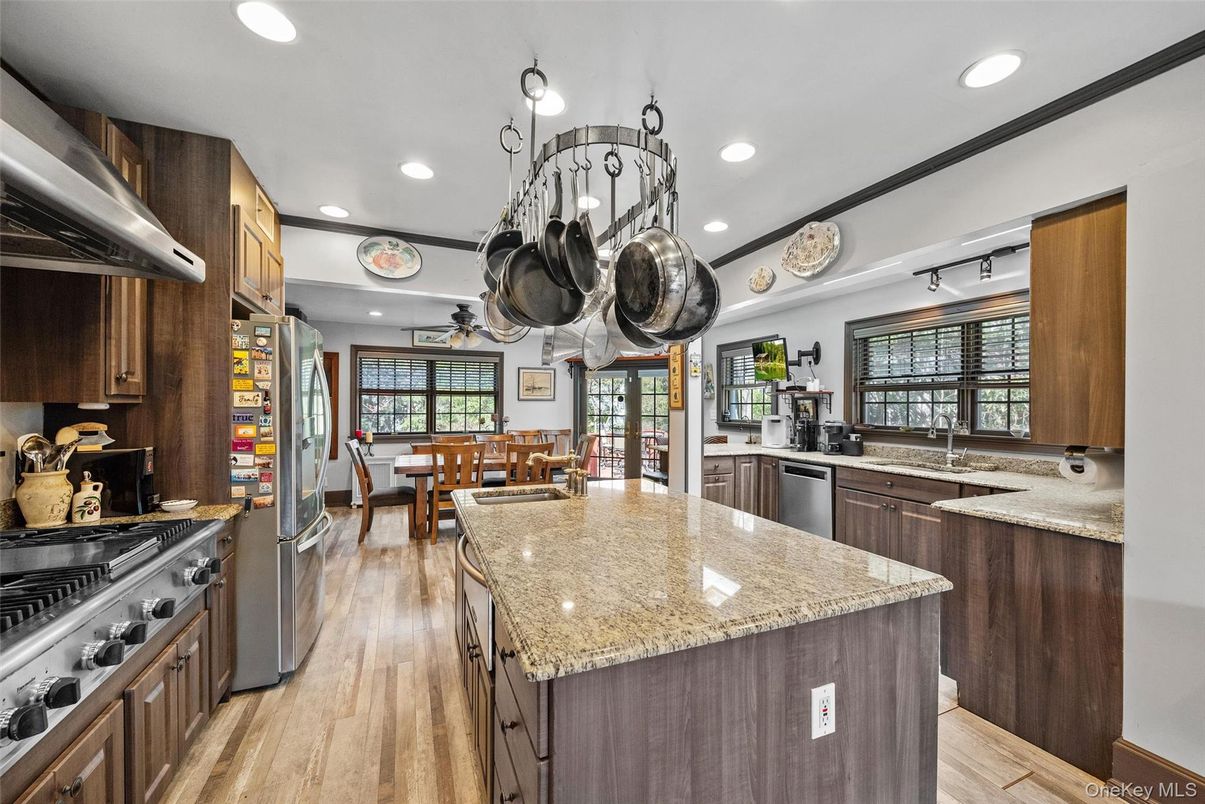 Dining room, Interior, Kitchen, Recessed Lighting, Stainless Steel Appliances, Wood Texture Flooring