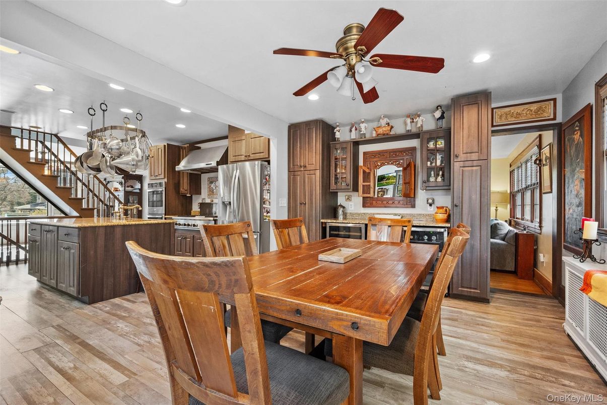 Dining room, Interior, Kitchen, Recessed Lighting, Stainless Steel Appliances, Wood Texture Flooring