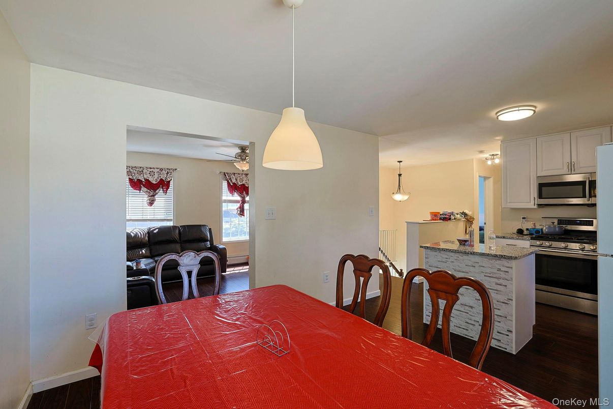 Dining room, Interior, Kitchen, Pendant Lights, Stainless Steel Appliances, Wood Texture Flooring
