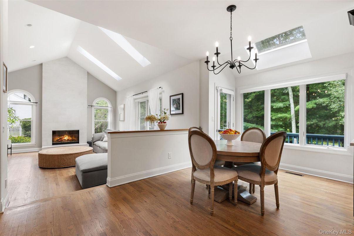 Chandelier, Dining room, Fireplace, Interior, Recessed Lighting, Wood Texture Flooring