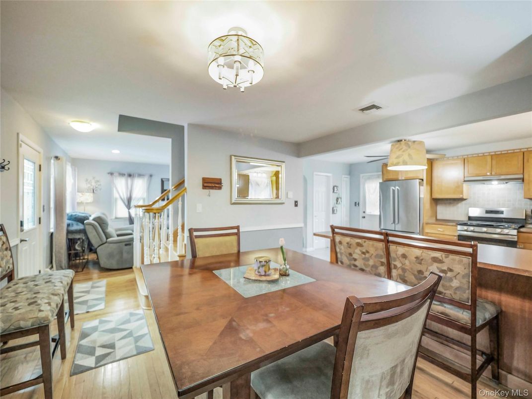 Dining room, Interior, Kitchen, Recessed Lighting, Stainless Steel Appliances, Wood Texture Flooring