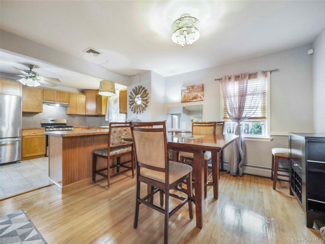 Dining room, Interior, Kitchen, Pendant Lights, Stainless Steel Appliances, Wood Texture Flooring