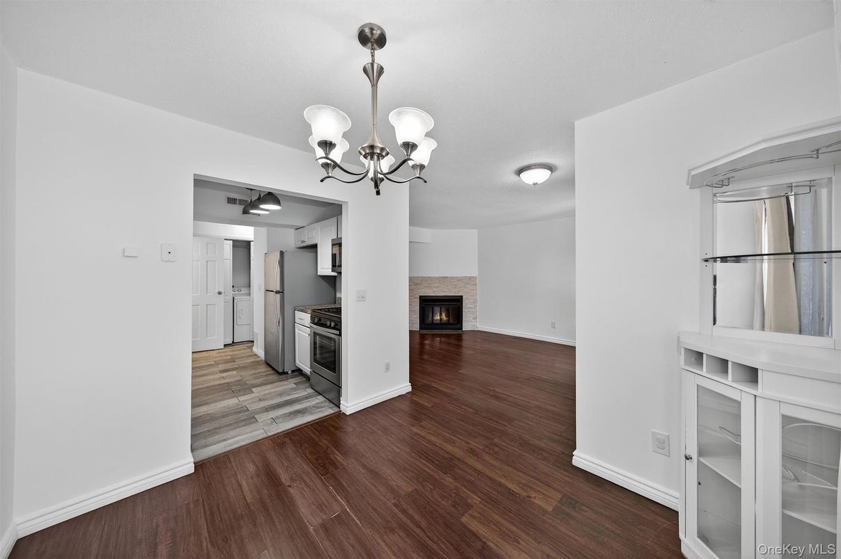 Chandelier, Empty room, Fireplace, Interior, Kitchen, Wood Texture Flooring
