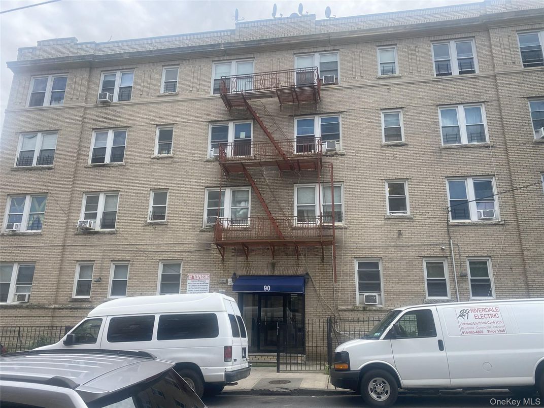 Exterior, Facade, Brick Facade, Condo Building