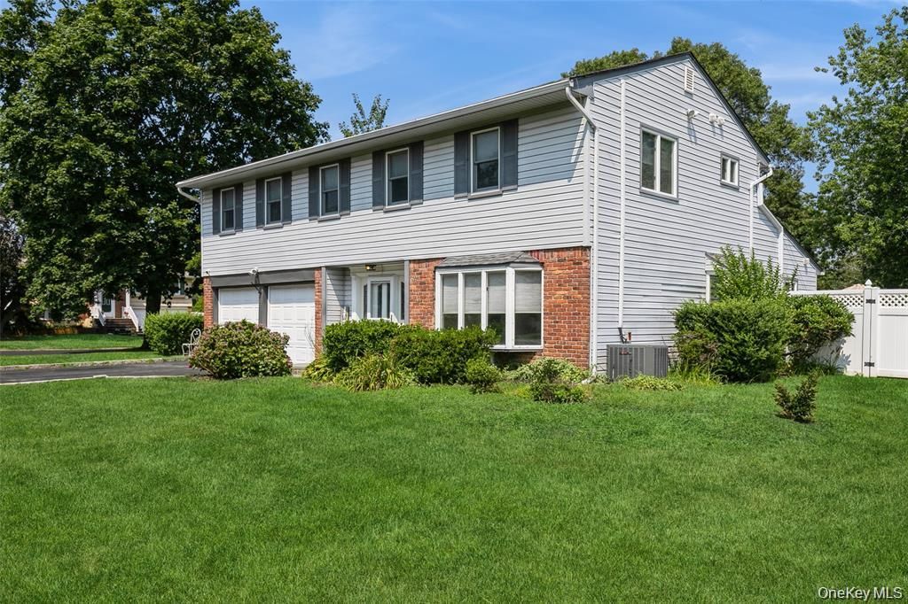 Attached, Exterior, Facade, Brick Facade, Raised Ranch