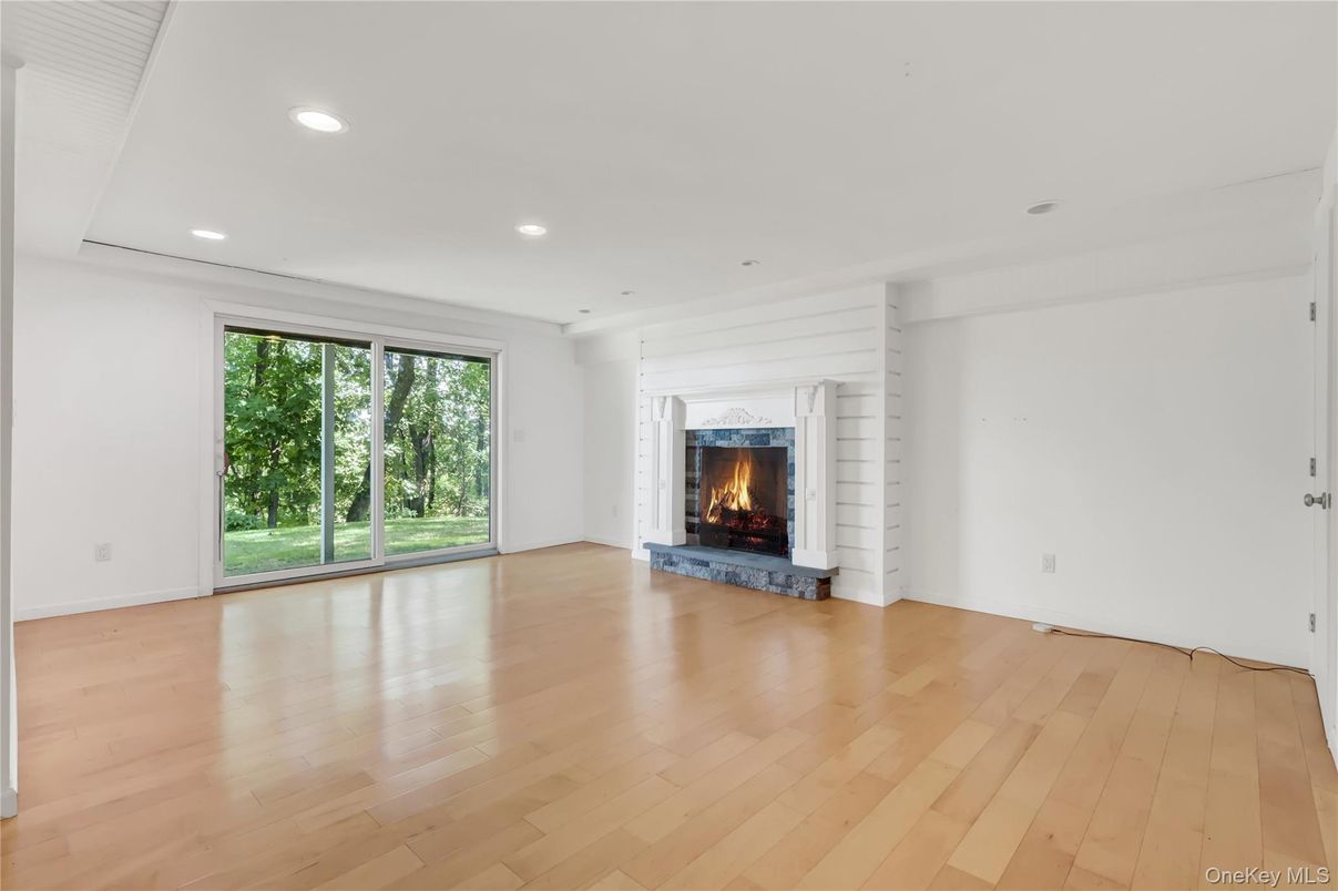 Empty room, Fireplace, Interior, Recessed Lighting, Wood Texture Flooring