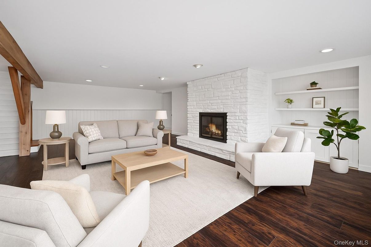 Fireplace, Interior, Living room, Recessed Lighting, Stone Walls, Wood Texture Flooring