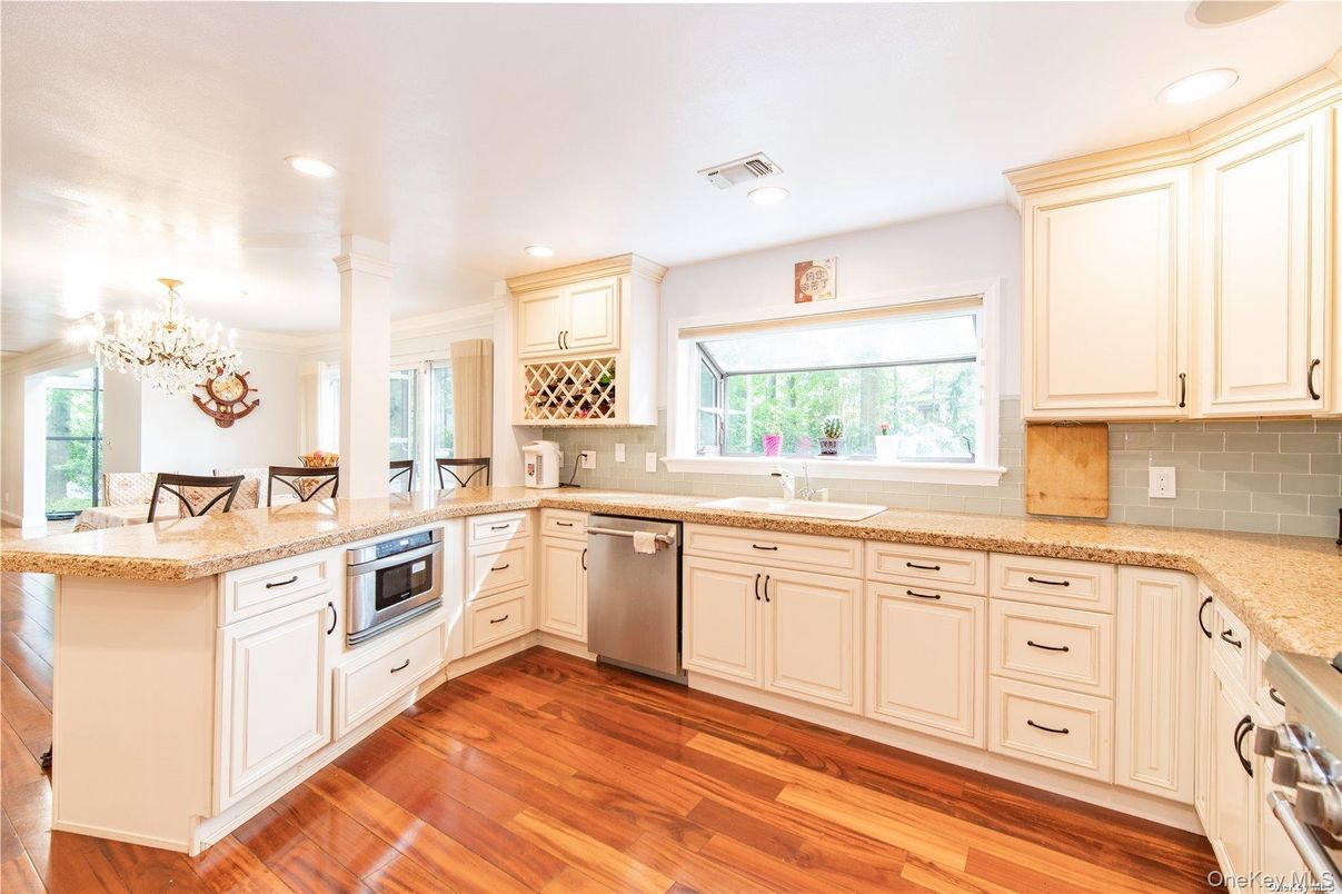 Chandelier, Interior, Kitchen, Recessed Lighting, Stainless Steel Appliances, Wood Texture Flooring